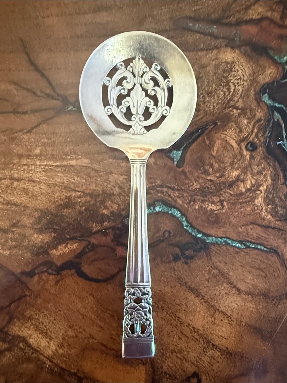 Small Slotted Nut Spoon by Community Plate